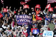 FILE - Supporters of former President Donald Trump cheer as he speaks at a Save America Rally. Jan. 15, 2022, in Florence, Ariz. (AP Photo/Ross D. Franklin, File)