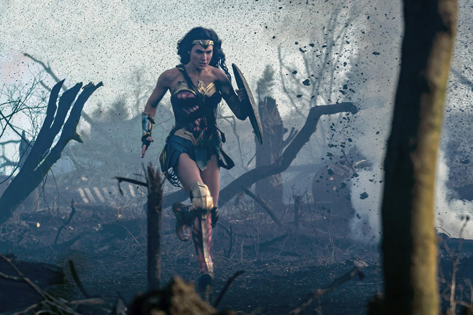 <p>Wonder Woman races across the battlefield, ready to storm the German trenches. (Photo: Warner Bros.)<br> </p>  <p>A Moment of Reflection</p><p> Steve tries to convince Diana to listen to his plan. (Photo: Warner Bros.)<br> </p>  <p>Lady in Blue</p><p> Diana certainly knows how to make an entrance to a gala. (Photo: Warner Bros.)<br> </p>  <p>Dance of Doom</p><p> Diana has her sword handy as she looks for an opportunity to strike down the general. (Photo: Warner Bros.)<br> </p>  <p>Reinforcements</p><p> Chief, Charlie, Sameer, and Steve follow Wonder Woman into battle. (Photo: Warner Bros.)<br> </p>  <p>The Team</p><p> Sameer, Steve, Wonder Woman, Chief, and Charlie strike a post-battle pose. The resulting photo will be unearthed decades later by Lex Luthor (in <em>Batman v Superman</em>) and eventually returned to Diana by Bruce Wayne. (Photo: Warner Bros.)<br> </p>