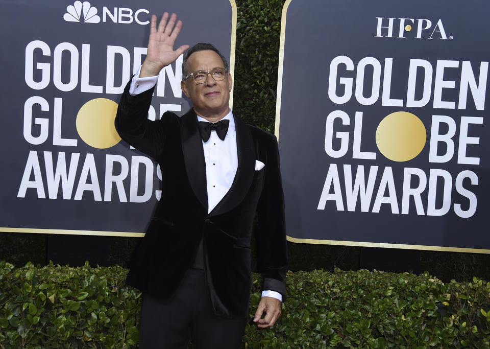 FILE - Tom Hanks arrives at the 77th annual Golden Globe Awards on Jan. 5, 2020, in Beverly Hills, Calif. Hanks turns 65 on July 9. (Photo by Jordan Strauss/Invision/AP, File)