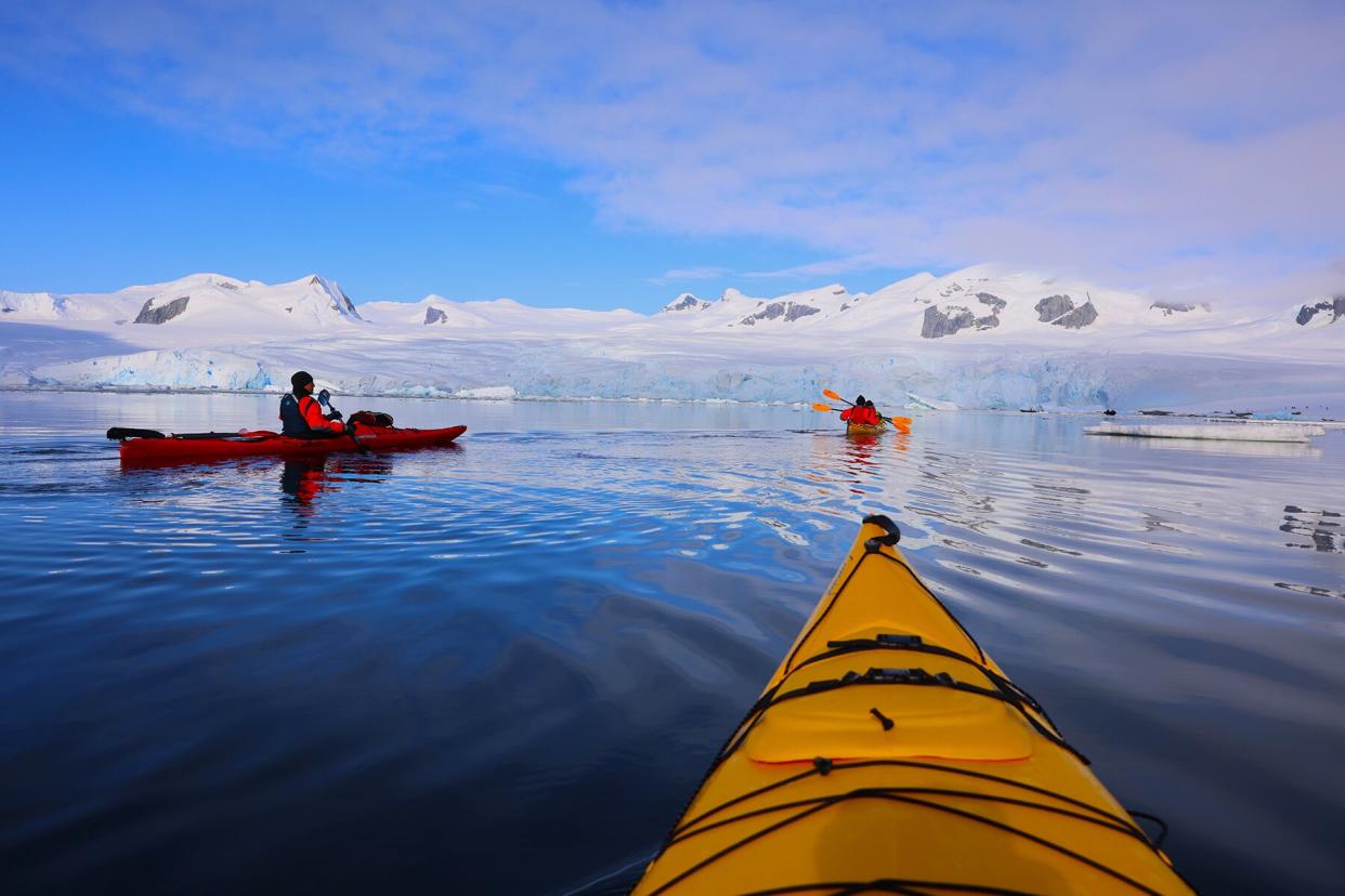 Kayaking in sunshine off Prospect Point, Antarctic