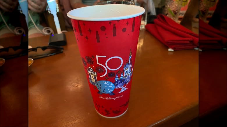 red Disney cup of water