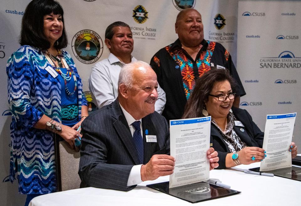 California State University, San Bernardino President Tomás Morales and California Indian Nations College President Celeste Townsend pose for a photo during a signing ceremony at Classic Club in Palm Desert, Calif., Tuesday, Oct. 4, 2022.