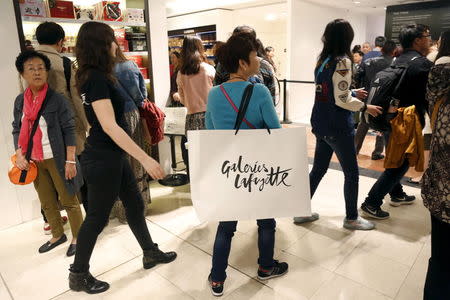 Customers visit the Galeries Lafayette department store in Paris, France, September 23, 2015. REUTERS/Charles Platiau