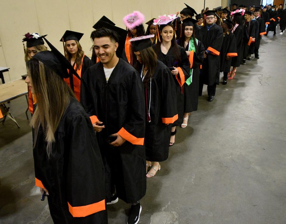 WORCESTER - Graduates proceed to North High's commencement at the DCU Center Wednesday, June 8, 2022.