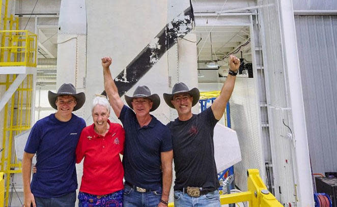 The New Shepard spacecraft's first crew (left to right): Oliver Daemen, aviation pioneer Wally Funk, Jeff Bezos and brother Mark Bezos. Launch on a 10-minute sub-orbital spaceflight is targeted for 9 a.m. EDT Tuesday. Two more passenger flights are expected before the end of the year. / Credit: Blue Origin