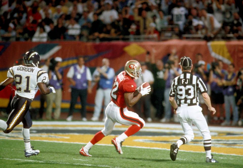 San Francisco 49ers running back (32) Ricky Watters scores one of his three touchdowns during Super Bowl XXIX against the San Diego Chargers at Joe Robbie Stadium. The 49ers defeated the Chargers 49-26.