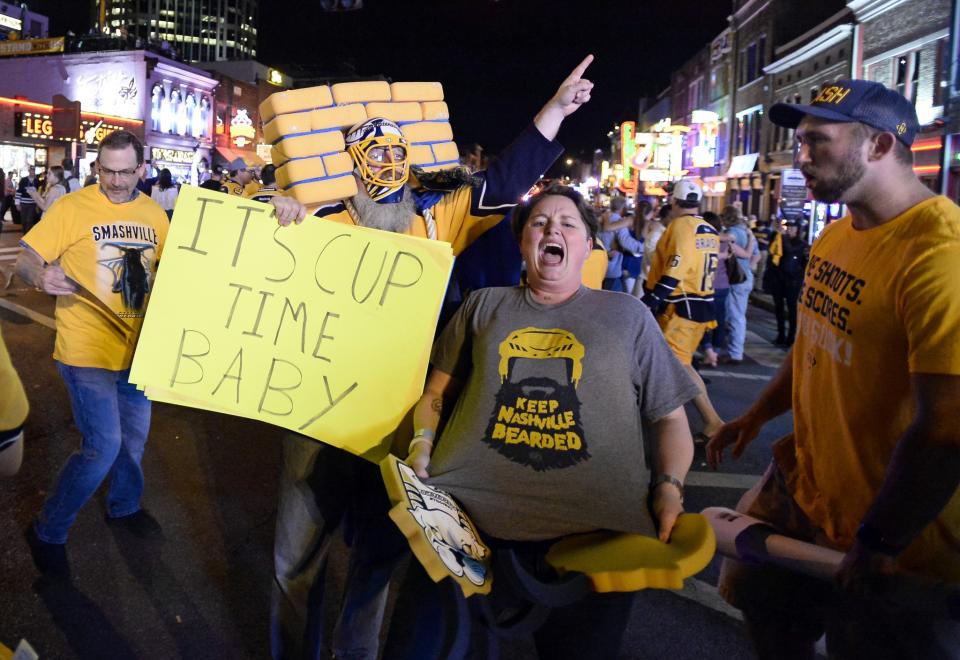 <p>Nashville Predators fans celebrate after Game 6 of the Western Conference final against the Anaheim Ducks in the NHL hockey Stanley Cup playoffs Monday, May 22, 2017, in Nashville, Tenn. The Predators won 6-3 to advance to the Stanley Cup Championship. (AP Photo/Mark Zaleski) </p>