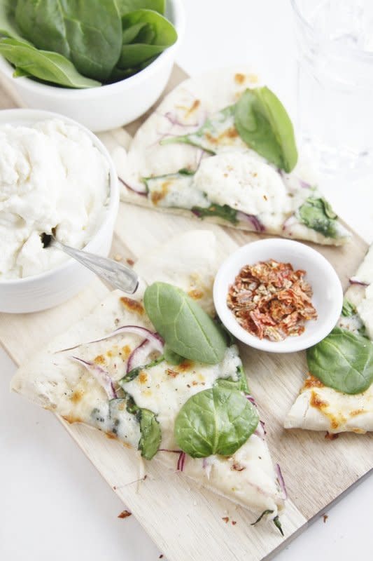 <strong>Get the <a href="http://www.bellalimento.com/2013/02/10/spinach-and-ricotta-pizza/" target="_blank">Spinach and Ricotta Pizza recipe</a> from Bell'Alimento</strong>