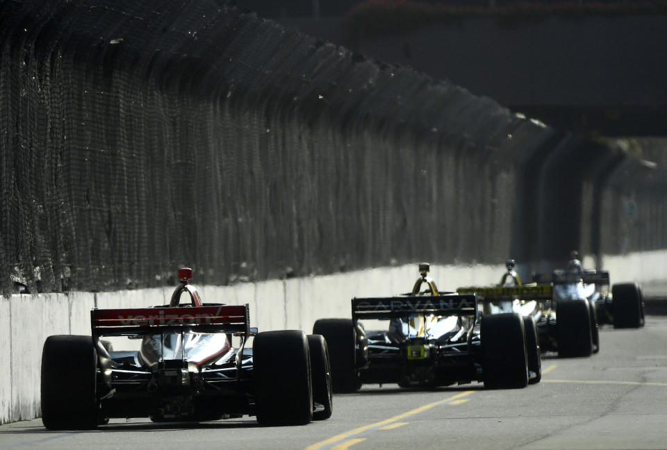 Indycar drivers race down Seaside Way during the final practice session for the Grand Prix of Long Beach auto race Saturday, Sept. 25, 2021, in Long Beach, Calif. (Will Lester/The Orange County Register via AP)