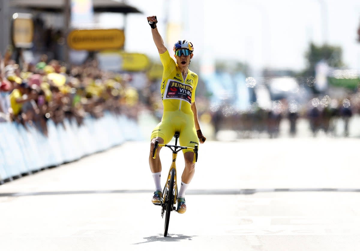 Wout van Aert celebrates winning stage four in Calais (Reuters)