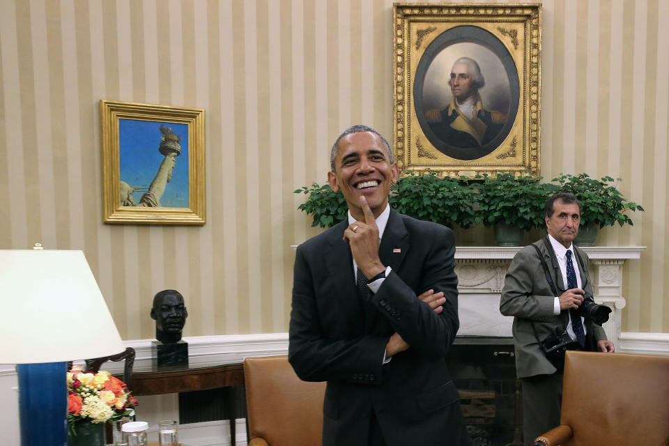 White House photographer Pete Souza as he snaps the former president. Source: Getty