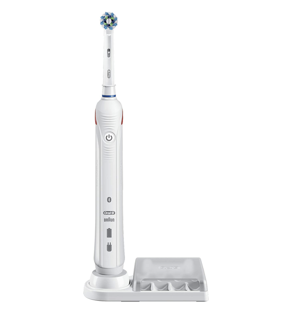 Oral-B Pro 3000 Rechargeable Toothbrush in white on battery stand (Photo via Amazon)