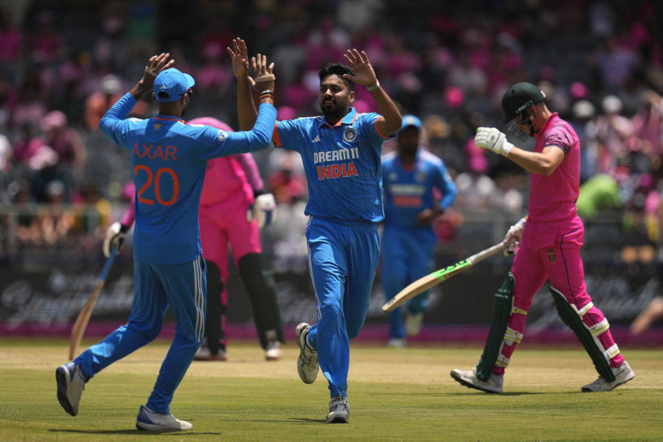 India's bowler Avesh Khan, centre, celebrates after dismissing South Africa's Wiaan Mulder, right, for a duck during the first One Day International cricket match between South Africa and India, at the Wanderers in Johannesburg, South Africa, Sunday, Dec. 17, 2023. (AP Photo/Themba Hadebe)