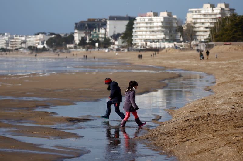 Children play on the beach of La Baule