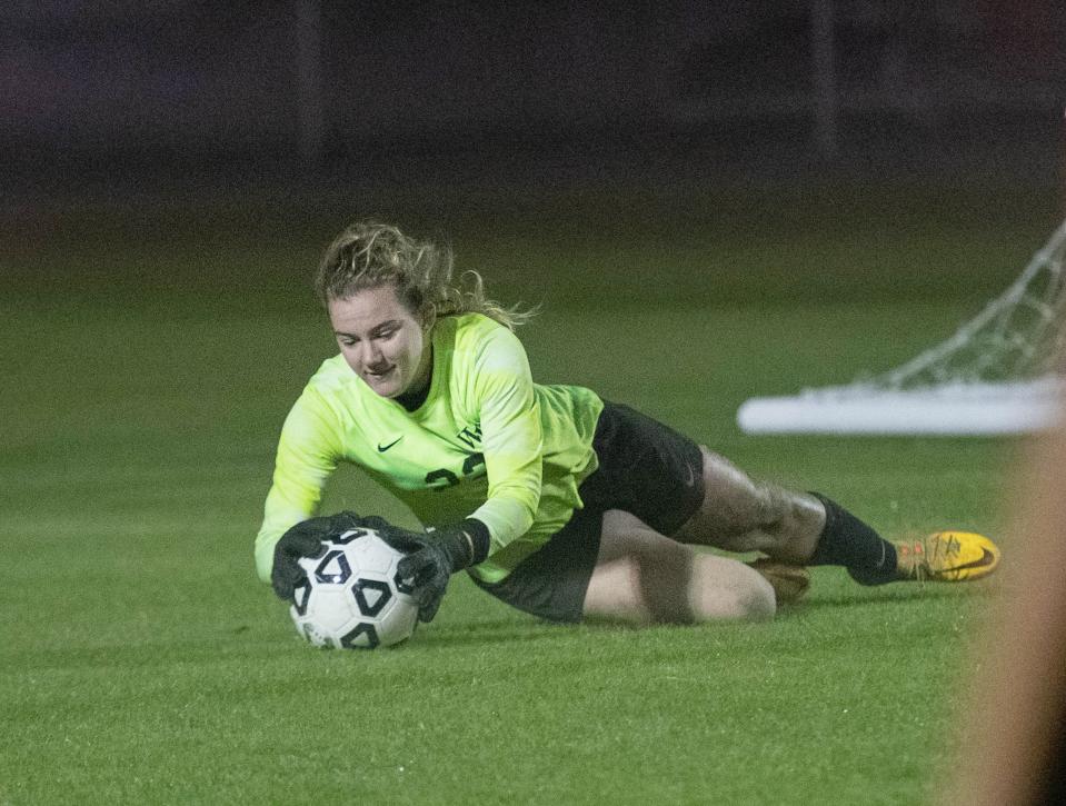 Jaguars goal keeper Katherine Stoll (22) moves to secure the ball during the Navarre vs West Florida girls soccer game at West Florida High School in Pensacola on Tuesday, Jan. 17, 2023.