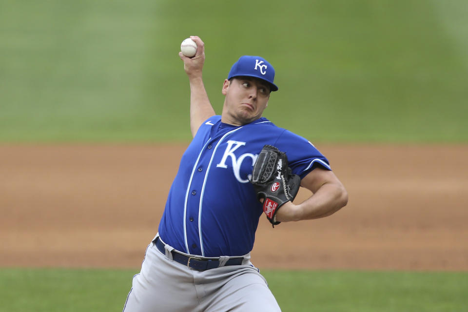 Kansas City Royals' pitcher Brad Keller throws against the Minnesota Twins during the first inning of a baseball game, Sunday, May 30, 2021, in Minneapolis. (AP Photo/Stacy Bengs)