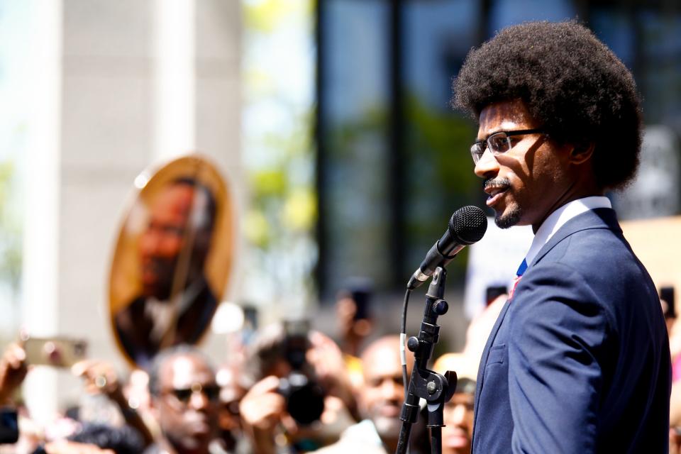 Justin Pearson speaks to supporters in Memphis, Tenn., on Wednesday, April 12, 2023, after he was reappointed to the Tennessee House of Representatives.