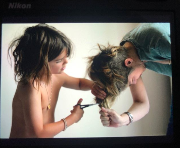 A photo of Selma Blair's eight-year-old son Arthur cutting her hair.