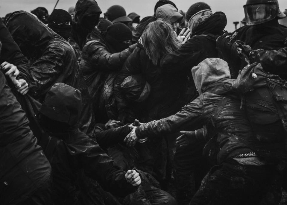 Climate activists clash with police during a protest against the eviction of the village of Lützerath, Germany on Jan. 14. The village was demolished to make way for a coal mine.<span class="copyright">Nico Knoll</span>