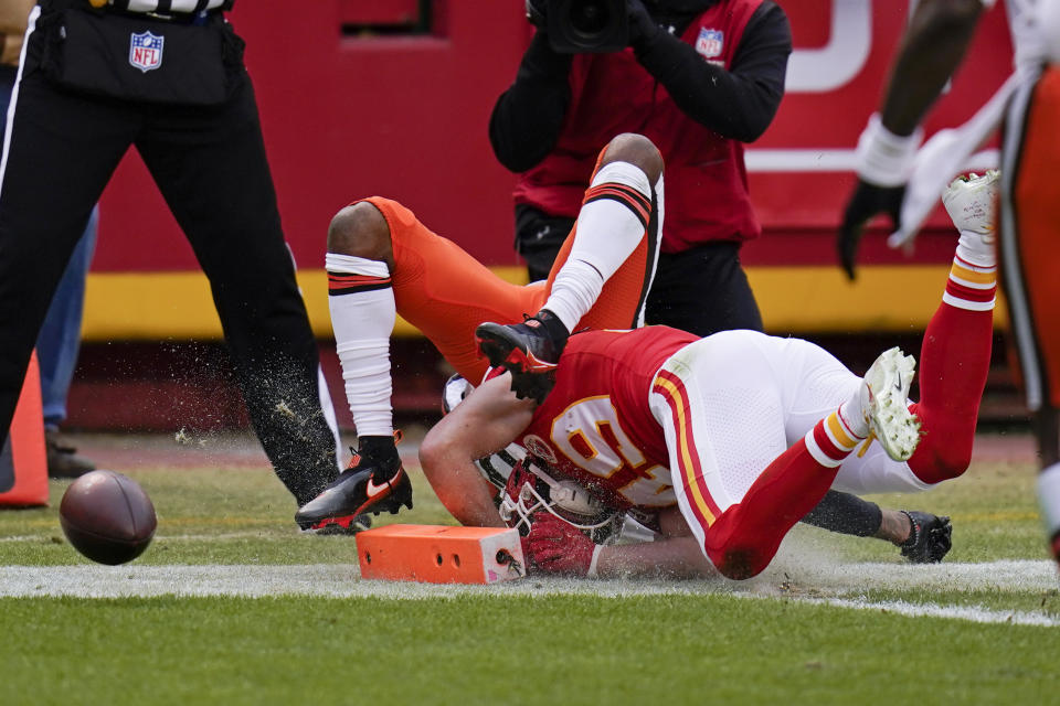 Cleveland Browns wide receiver Rashard Higgins, rear, fumbles the ball as he is tackled by Kansas City Chiefs safety Daniel Sorensen (49) during the first half of an NFL divisional round football game, Sunday, Jan. 17, 2021, in Kansas City. (AP Photo/Jeff Roberson)