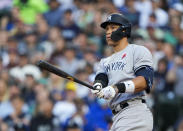 New York Yankees' Aaron Judge watches his two-run home run against the Seattle Mariners during the third inning of a baseball game Monday, May 29, 2023, in Seattle. (AP Photo/Lindsey Wasson)