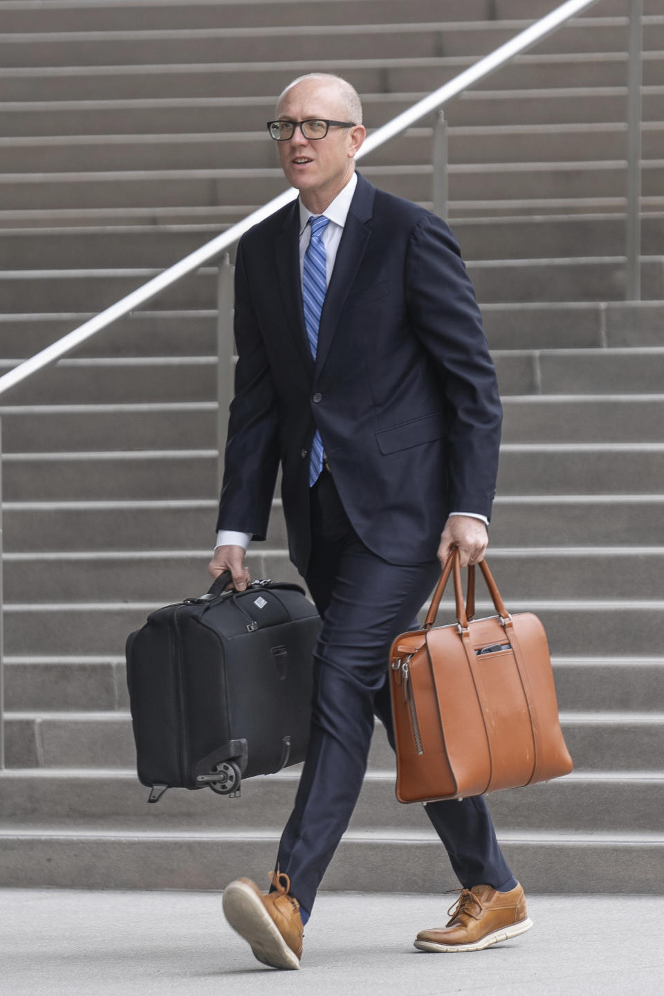 Federal prosecutor Leo Wise arrives at federal court Wednesday, May 22, 2024, in Los Angeles. Hunter Biden's lawyers are pressing a judge to delay his federal tax trial set to begin next month in Los Angeles.(AP Photo/Damian Dovarganes)