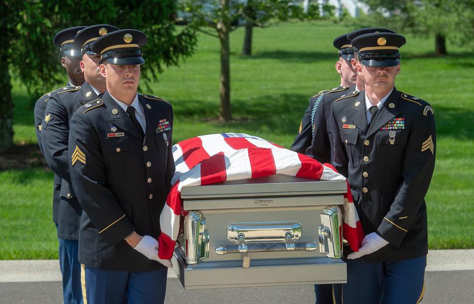 U.S. Army National Guard Pennsylvania Military Funeral Guard carrying the casket of  WW II U.S. Army Pvt. Walter G. Wildman, of Bristol, to Shelter 1 for reinterment, Monday, May 23, 2022, at Washington Crossing National Cemetery.