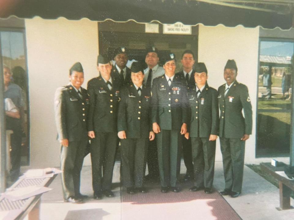 After enlisting in the U.S. Army, Laura Meza, center left, was deployed to Iraq. / Credit: Courtesy of Laura Meza