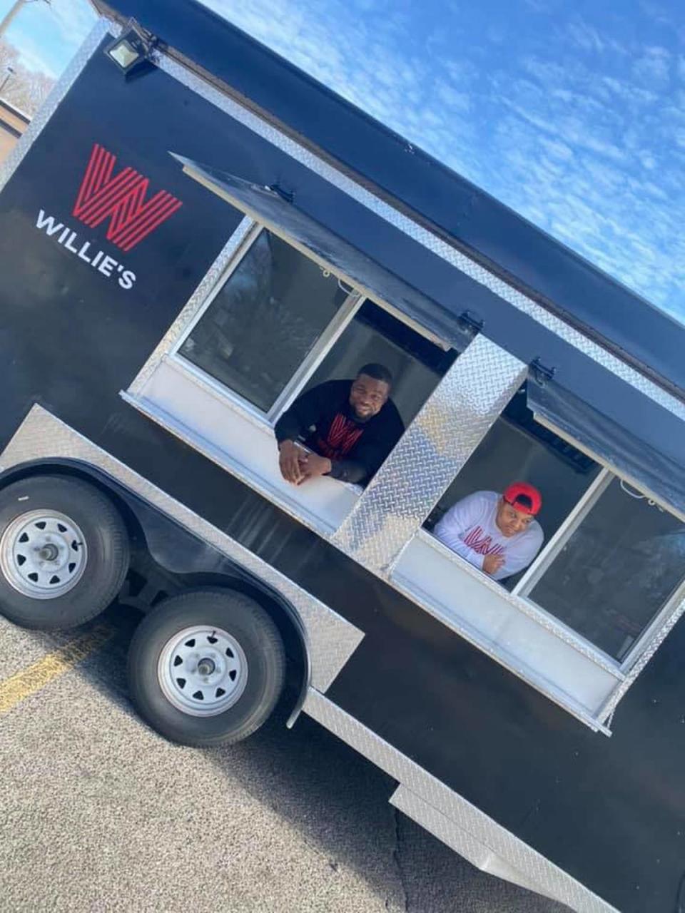 Willie Finley, left, the owner of Willie’s Wings, is opening a new food truck park in Wichita. His truck will become a permanent fixture there.