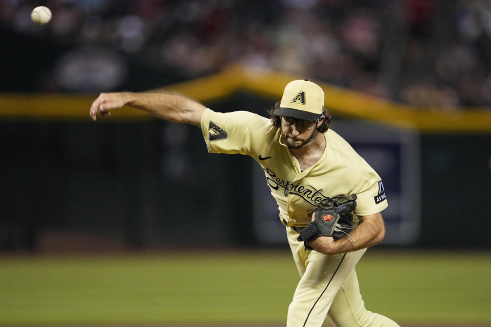 Arizona Diamondbacks starting pitcher Zac Gallen throws against the Houston Astros during the first inning of a baseball game, Friday, Sept. 29, 2023, in Phoenix. (AP Photo/Matt York)