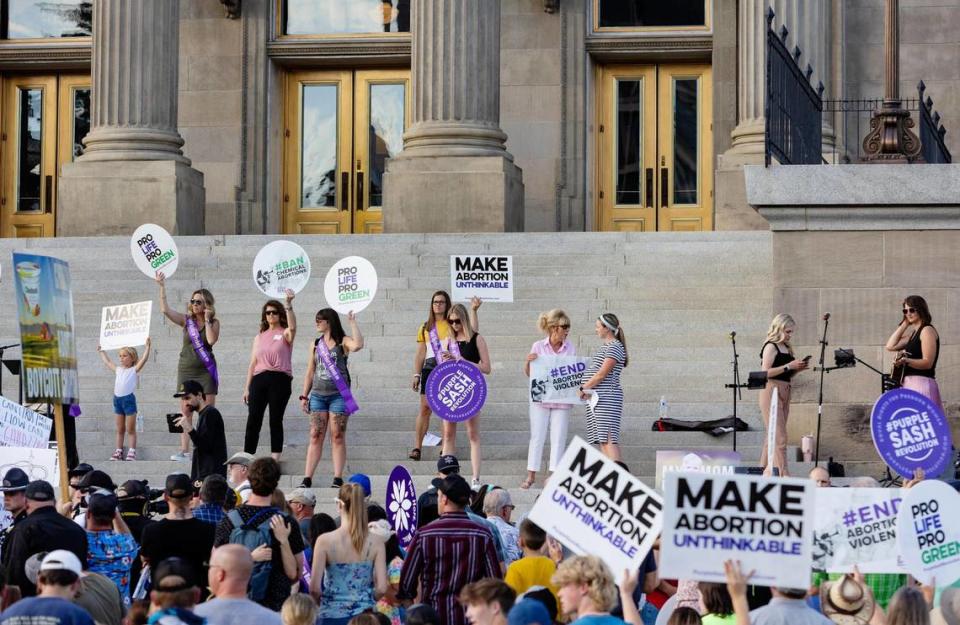 People hold a pro-life celebration outside of the Idaho Statehouse in Boise on Tuesday, June 28, 2022.
