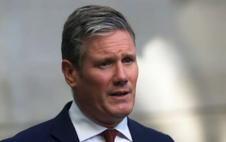 Labour Party's Shadow Secretary of State for Brexit Keir Starmer speaks to the media as he leaves the BBC Headquarters after appearing on The Andrew Marr show in London