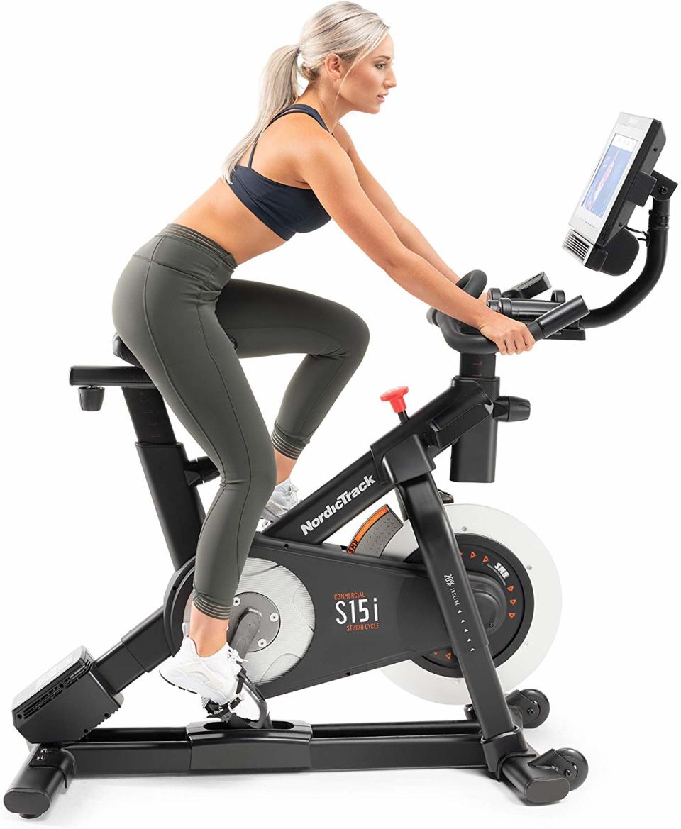 You go, girl—on this pro-level NordicTrack Commercial Studio Cycle Bike.  (Photo: Amazon)