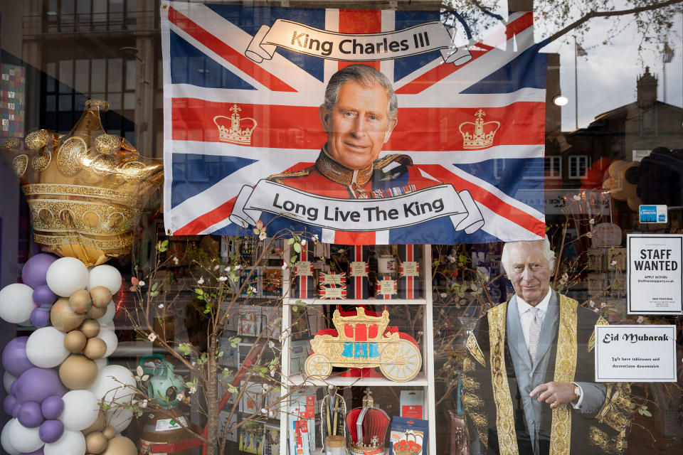 With two weeks before the coronation of King Charles III takes place, his face and other royal merchandise is on display in the window of a party and balloon shop business in Kensington, on April 19, 2023.<span class="copyright">Richard Baker—In Pictures/Getty Images</span>