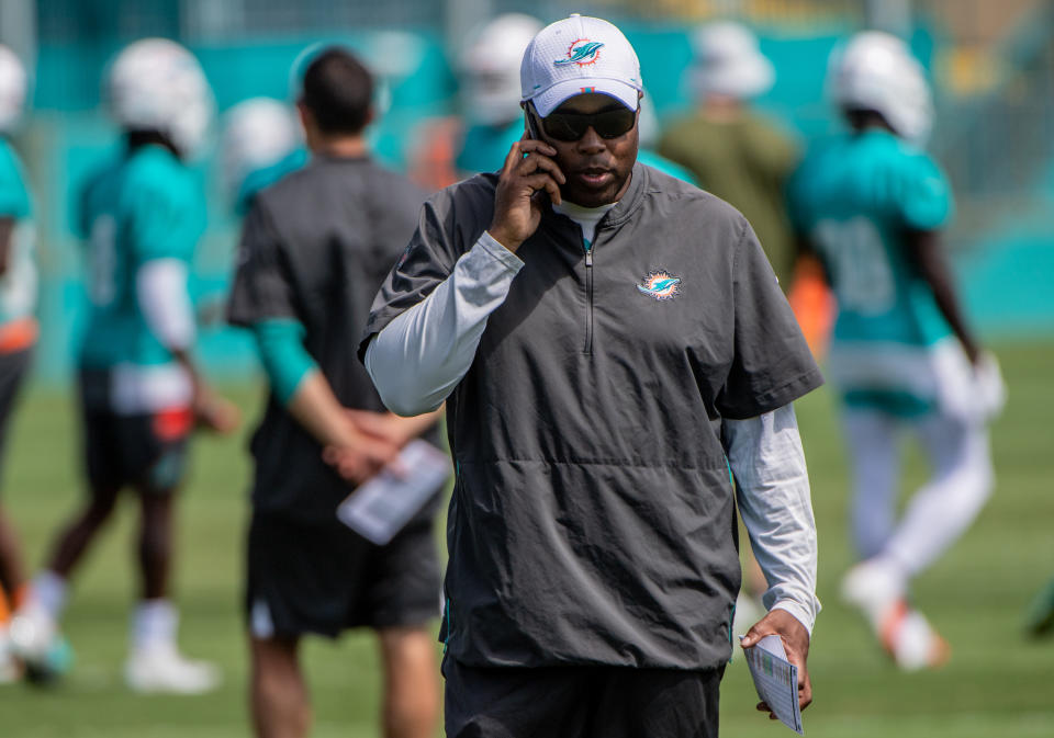 Miami Dolphins GM Chris Grier has all the ammo to draft Tua Tagovailoa — if he wants to. (Photo by Mark Brown/Getty Images)