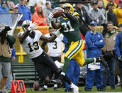 <p>Green Bay Packers cornerback Davon House (31) intercepts a pass intended for New Orleans Saints wide receiver Michael Thomas (13) during the first half of an NFL football game, Sunday, Oct. 22, 2017, in Green Bay, Wis. (AP Photo/Mike Roemer) </p>