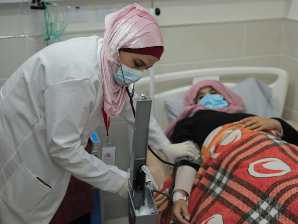 Nurse Heba Shalan from the Gaza Strip says she is often paid less than her full salary; Oxfam says women have been hit harder by the crisis (Marwas Sawaf/Oxfam)