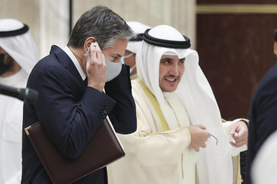 Kuwaiti Foreign Minister Sheikh Ahmad Nasser Al-Mohammad Al-Sabah and U.S. Secretary of State Antony Blinken depart at the end of a joint news conference at the Ministry of Foreign Affairs in Kuwait City, Kuwait, Thursday, July 29, 2021. (Jonathan Ernst/Pool via AP)