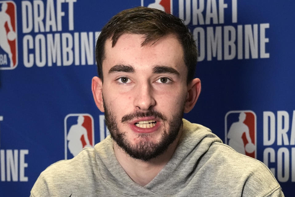 Alex Karaban talks to media during the 2024 NBA basketball Draft Combine in Chicago, Tuesday, May 14, 2024. (AP Photo/Nam Y. Huh)