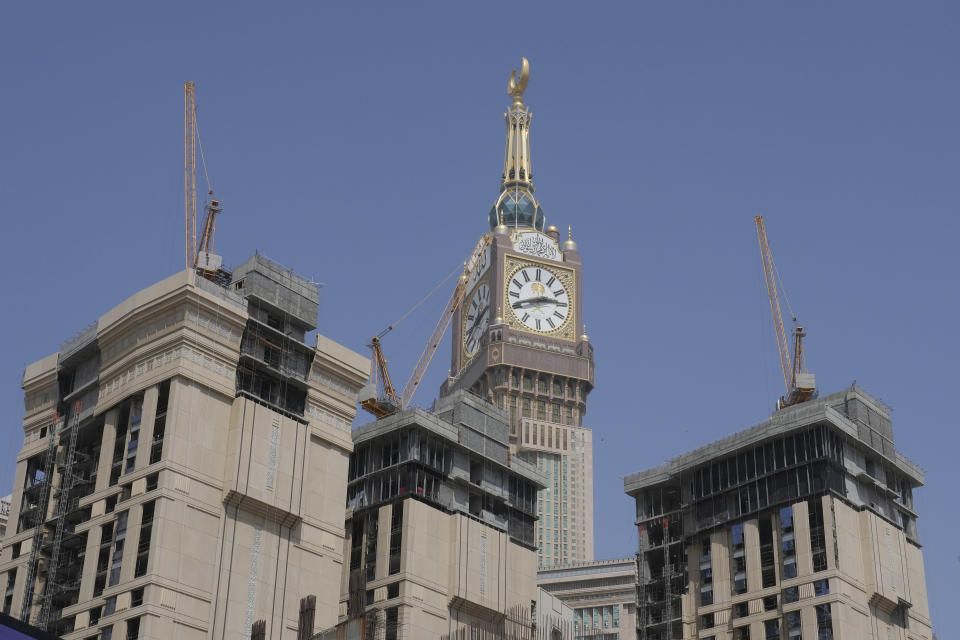 Cranes are seen on new towers near the Grand Mosque during the Hajj pilgrimage in the Muslim holy city of Mecca, Saudi Arabia, Sunday, June 25, 2023. Saudi Arabia is pumping billions of dollars into the holy city of Mecca to meet its ambitious economic targets, with high-end hotels, apartment blocks, retailers and restaurants planned for areas around the Grand Mosque. (AP Photo/Amr Nabil)