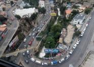 An aerial view of line of cars to get gasoline in La Paz