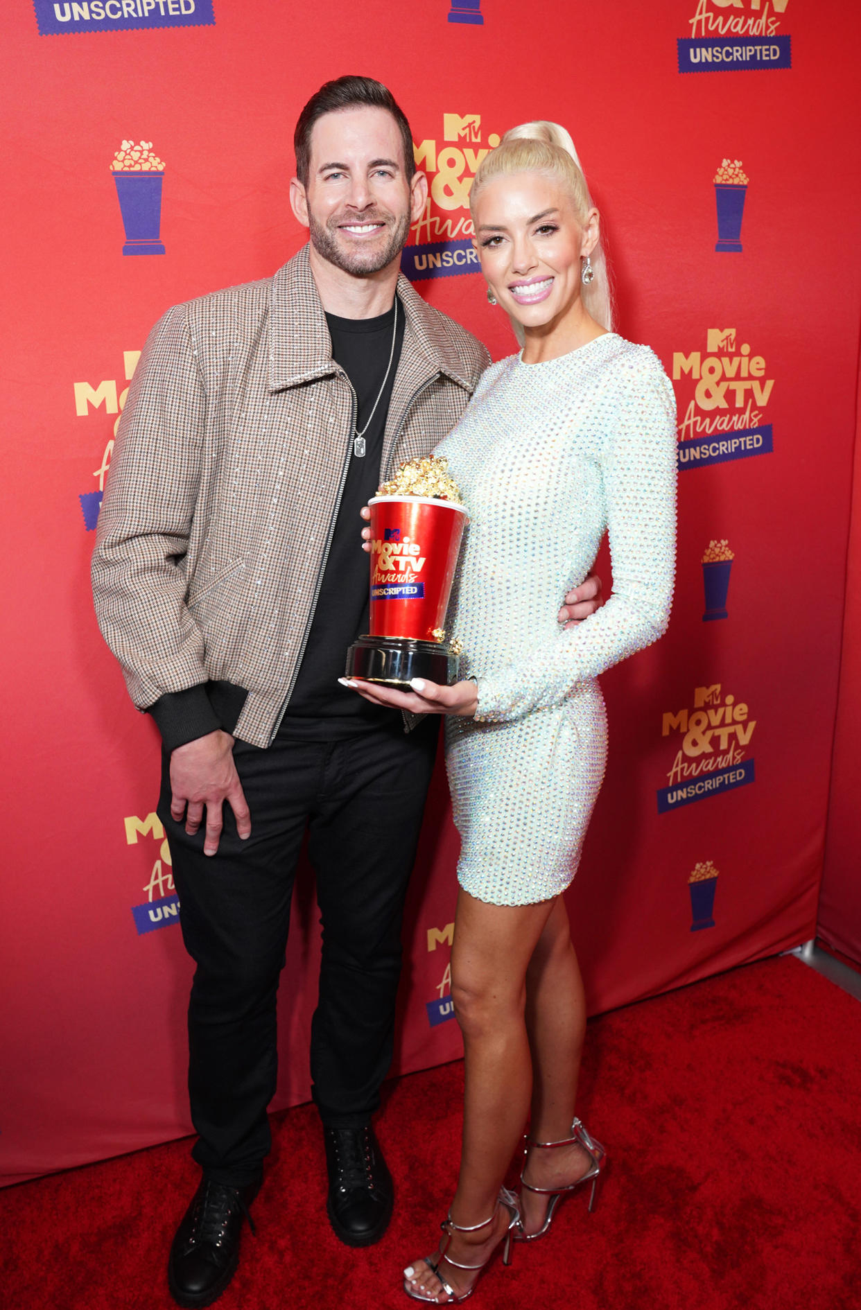 Tarek El Moussa and Heather Rae El Moussa attend the 2022 MTV Movie & TV Awards on June 5, 2022. (Presley Ann / Getty Images)