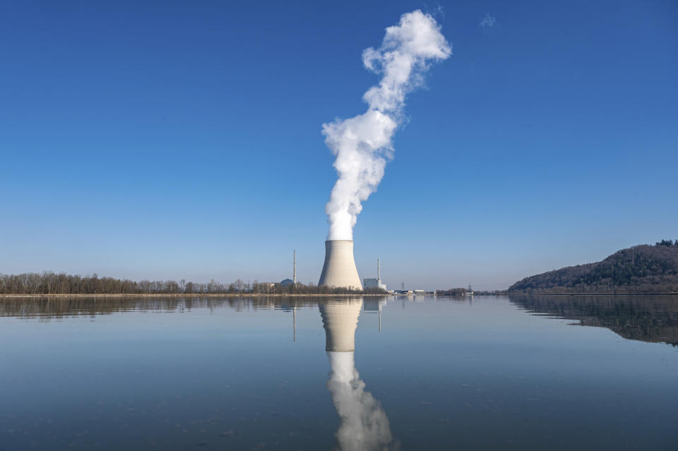 FILE - The nuclear power plant (NPP) Isar 2 is pictured in Essenbach, Germany, March 3, 2022. German Chancellor Olaf Scholz has ordered preparations for all of the country's three remaining nuclear reactors to continue operating until mid-April 2023. The move marks another hiccup in the country's long-running plan to end the use of atomic energy. (Armin Weigel/dpa via AP, File)