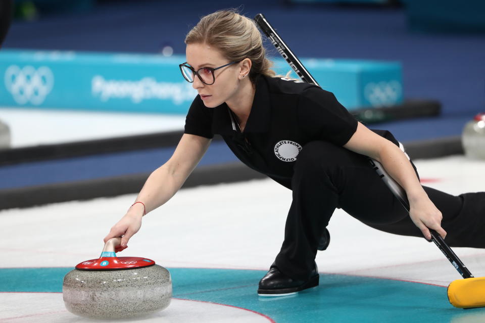 <p>Olympic Athlete from Russia Galina Arsenkina places a stone during a match against Great Britain in Session 1 of the Women’s Round Robin curling competition at the 2018 Winter Olympic Games at Gangneung Curling Centre. Valery Sharifulin/TASS (Photo by Valery Sharifulin\TASS via Getty Images) </p>