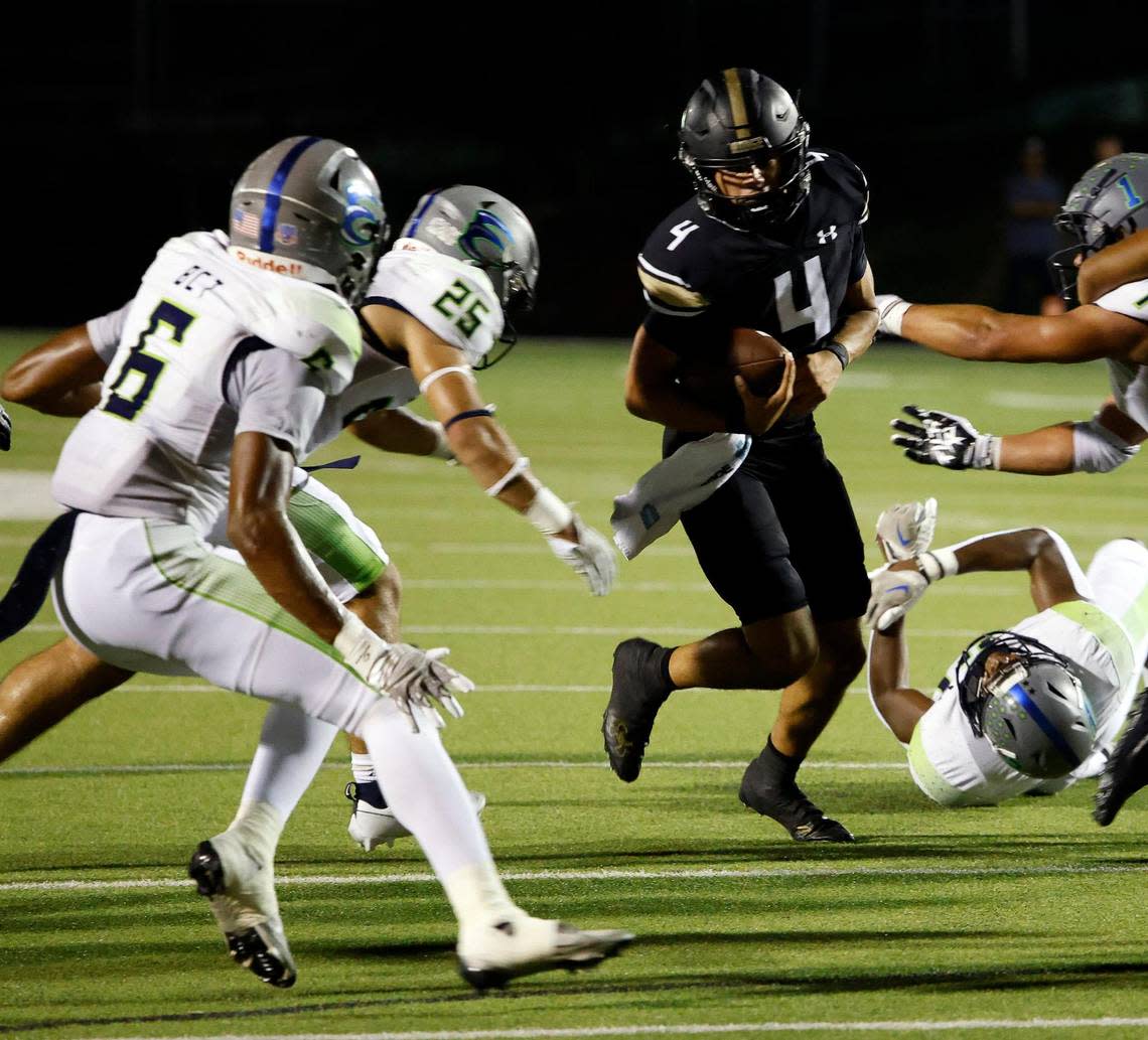 Keller Fossil Ridge quarter back Logan Cundiff (4) cuts back to the inside in the first half of a UIL high school football game at Keller ISD Stadium in Keller, Texas, Thursday, Sept. 21, 2023. Haslet Eaton led 24-14 at the half. Bob Booth/Special to the Star-Telegram