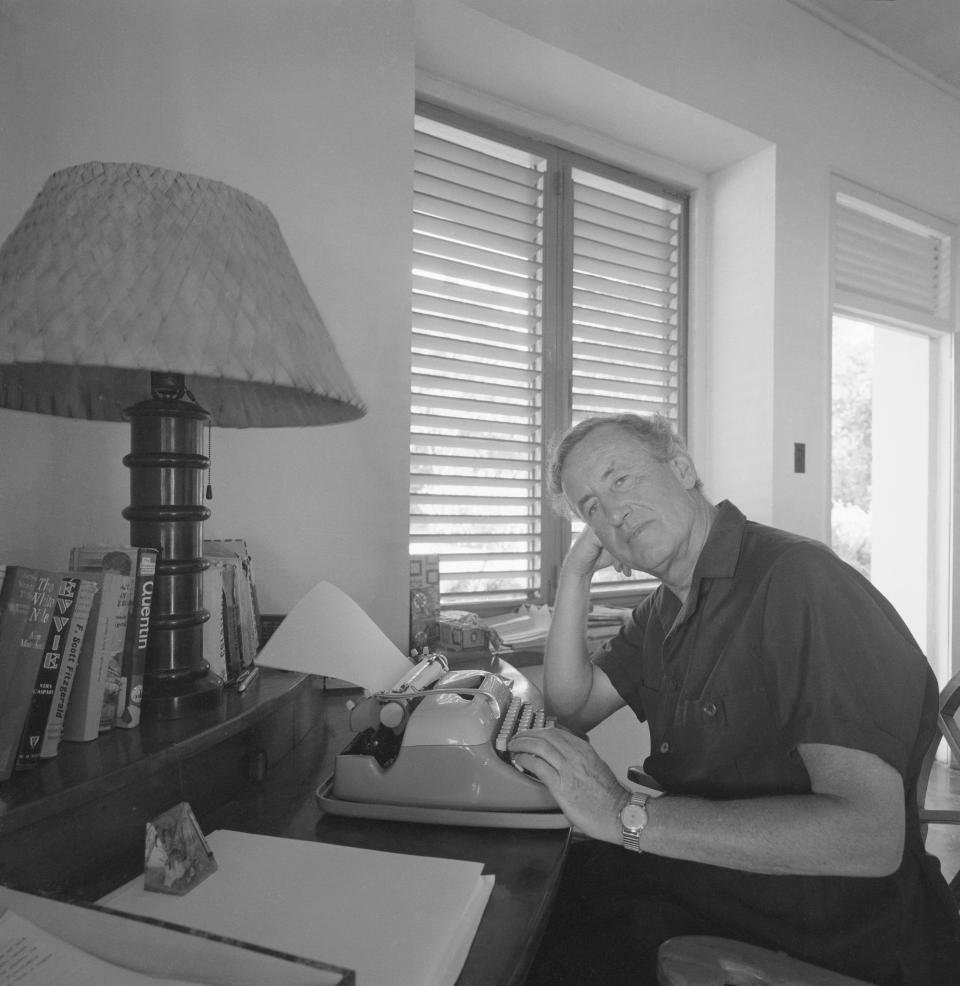 Novelist Ian Fleming, creator of the James Bond 007 series, looks up from his typewriter. (Photo by © Bradley Smith/CORBIS/Corbis via Getty Images)