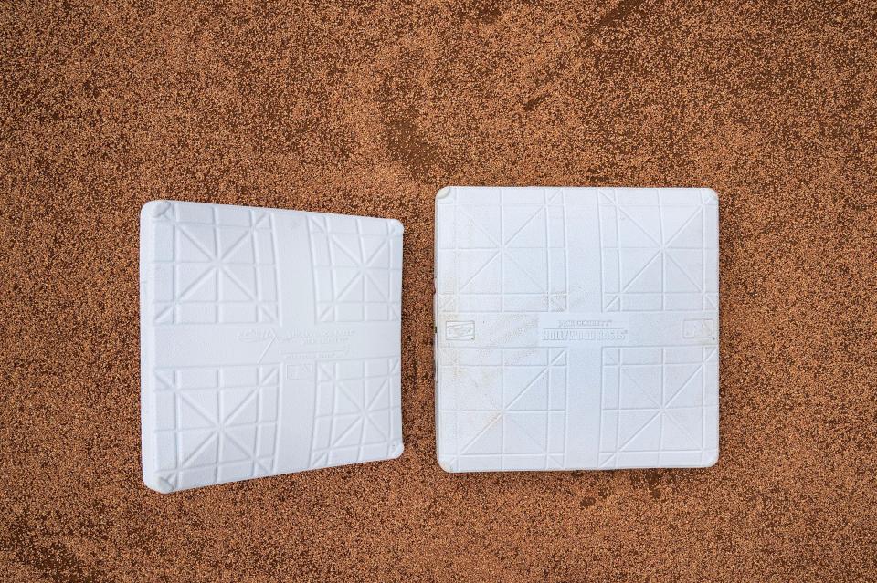 MLB has moved to using a bigger base (right) from the standard base (left) for the 2023 season.