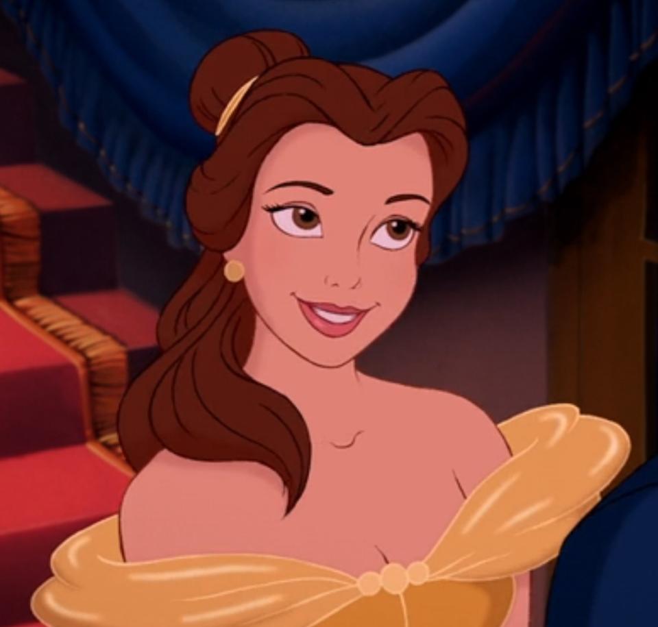Belle smiles at the Beast as they prepare to dance