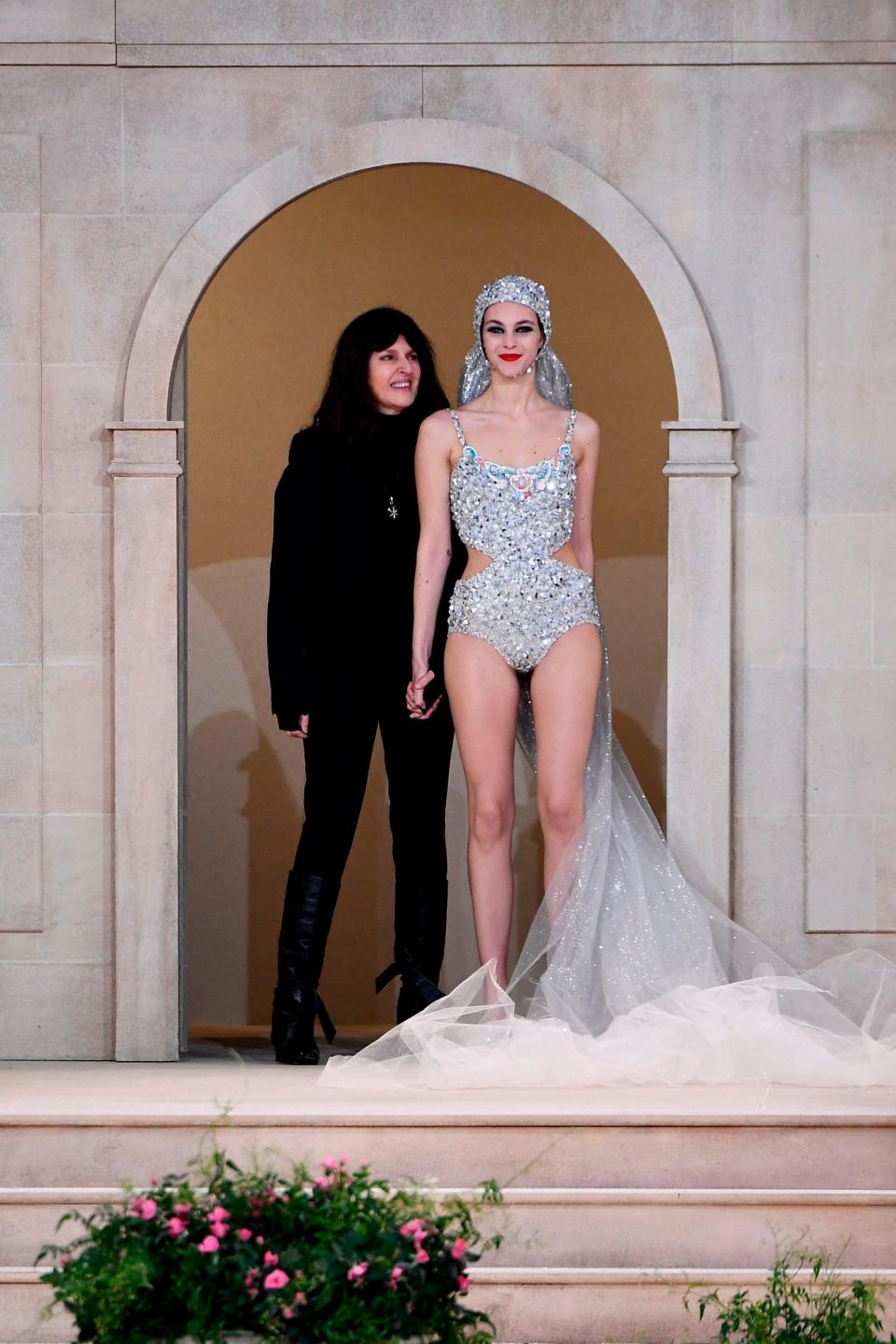 Virginie Viard with Italian model Vittoria Ceretti, at the end of the Chanel spring/summer 2019 Haute Couture show at the Grand Palais in Paris ​(AFP/Getty Images)