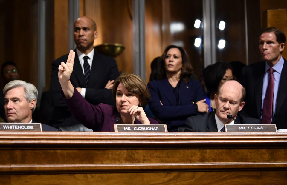 Senate Judiciary Committee members, left to right, Sheldon Whitehouse, Cory Booker, Amy Klobuchar, Kamala Harris, Christopher Coons and Richard Blumenthal look on during a hearing on Capitol Hill ion the nomination of Brett Kavanaugh to be an associate justice of the Supreme Court.